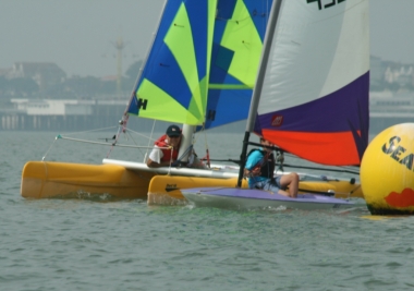 Cat meets Dinghy....Robert Mitchell says hello to Harry Swinbourne