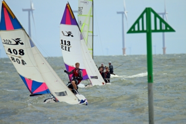 Some tight afternoon racing in the 405 class - Charlie and Harry Spence in 113 overtaking Harry Swinbourne and Tom Philpot in 408