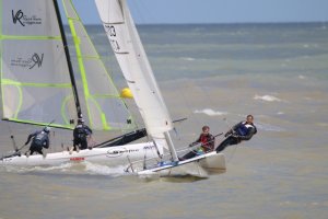 Liam Wright, with father Ian crewing, heading to take the honours in the Catamaran race