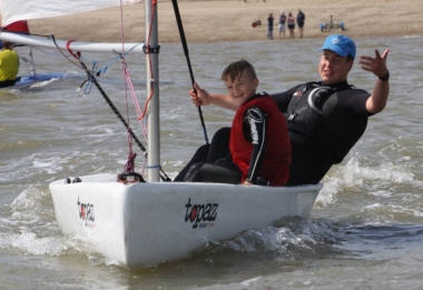 Cadet Commodore Harry Swinbourne, winner of the Cadet Single Helm, teaching George Smith at SOS Cadet Sail Training the day before