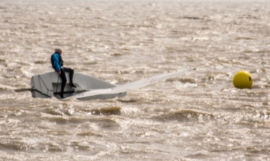 But disaster strikes for Dunnett when he capsizes at the mark