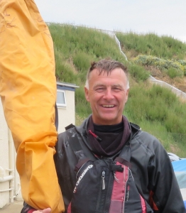 Packing his boat away, after a great race - John Tappenden