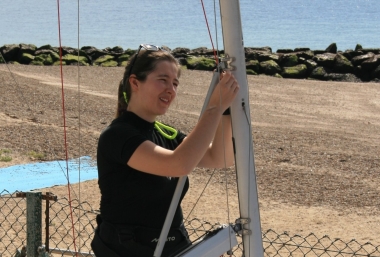 Clare Williams rigging her Xenon before taking second place with her crew Michael Giles